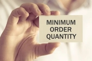 man holding minimun order quantity plate